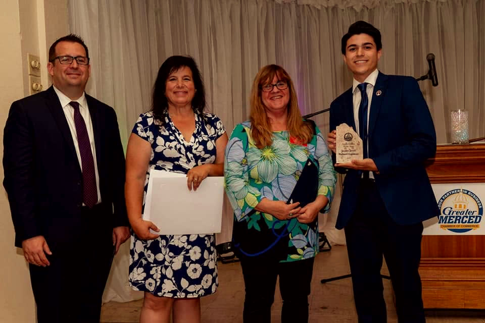 Jessee receiving Youth Citizen of the Year with the mayor